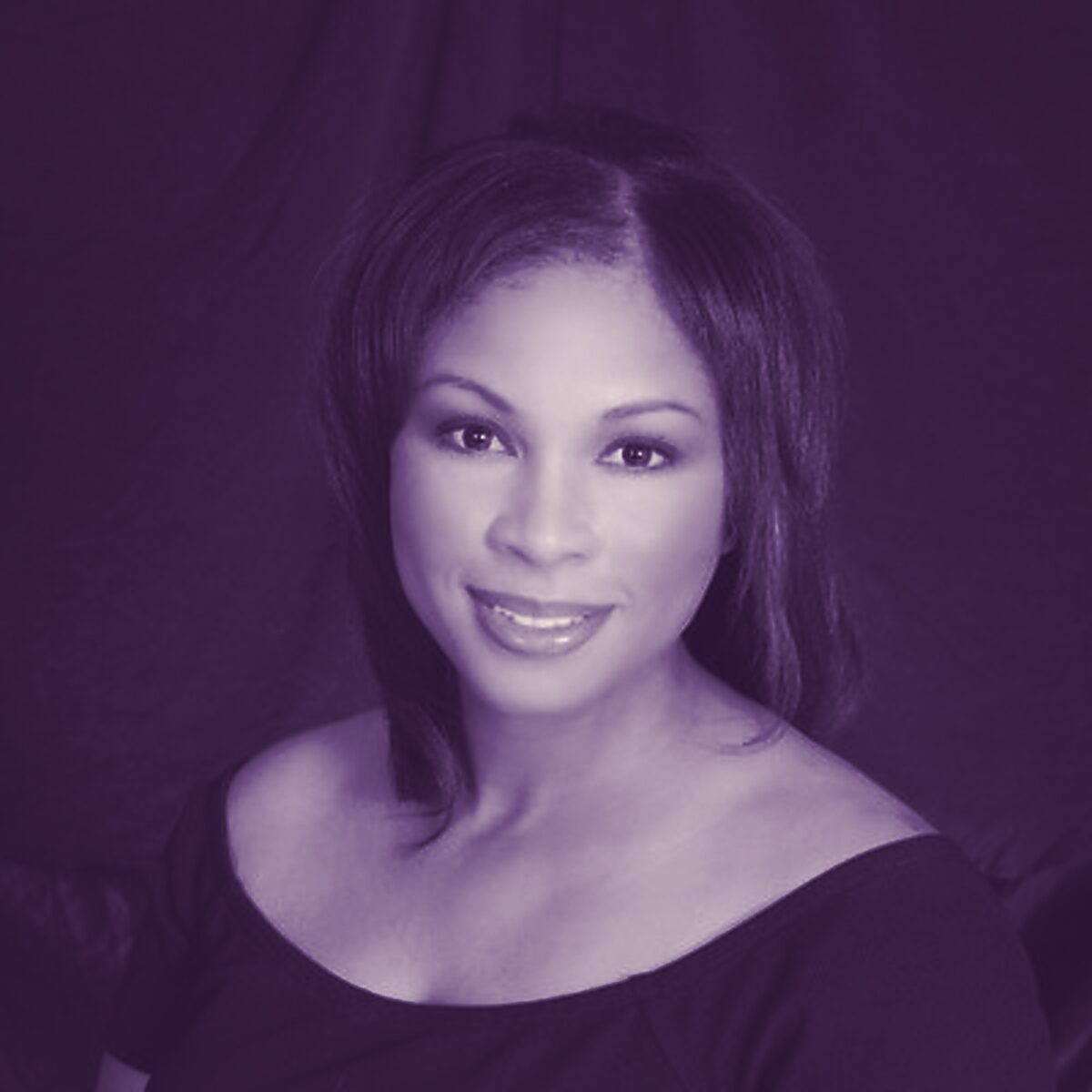 Portrait of a woman, standing in for a photograph of Regina Wilson.